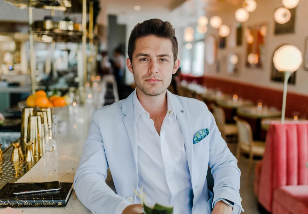 man drinking in a bar, elegant mood
