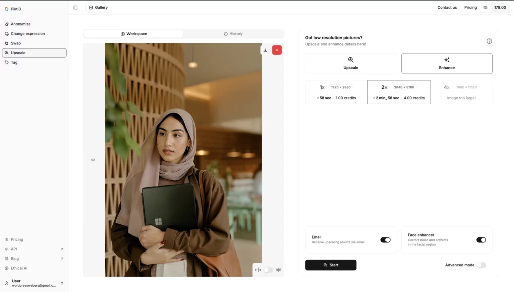 Immagine finale migliorata di una donna con sciarpa rosa dopo aver utilizzato la funzione di miglioramento di SuperID