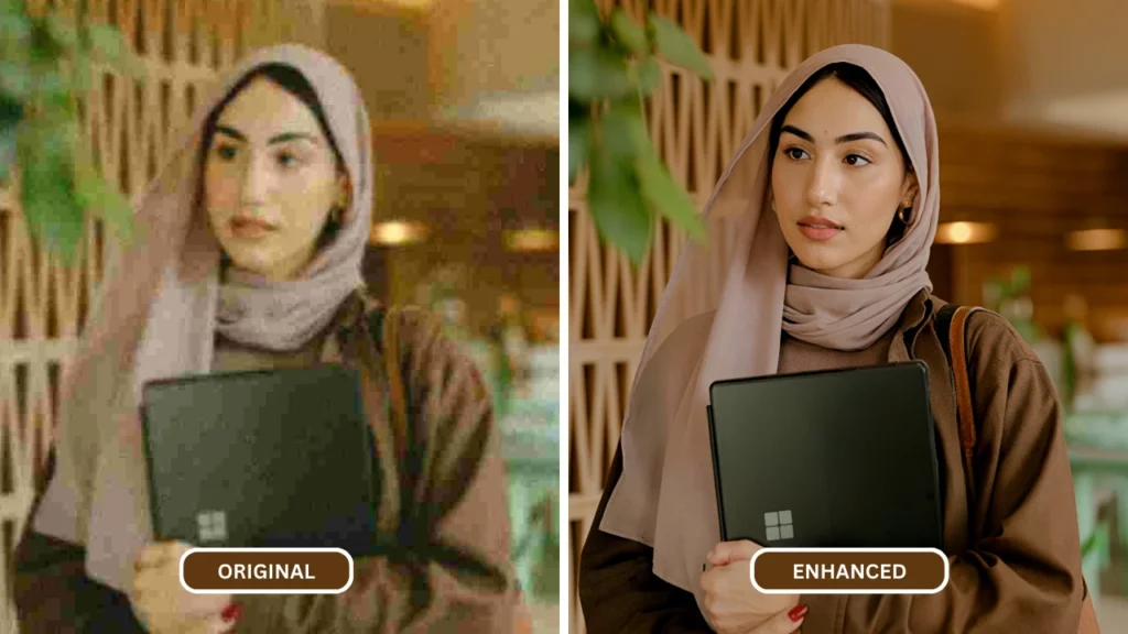 migliorare la qualità della foto di una donna che tiene in mano un portatile Microsoft e un top marrone