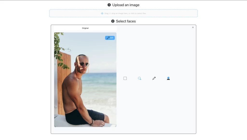 Uploading the original image of a bald man sitting near a beach wearing sunglasses