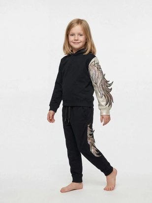 girl with unicorn hoody