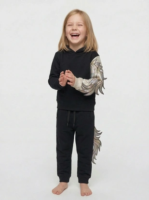 girl with unicorn hoody happy